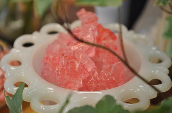 Pink rock candy in milk glass